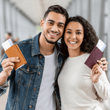 happy-travellers-young-arab-couple-with-passports-2023-11-27-04-50-21-utc 1